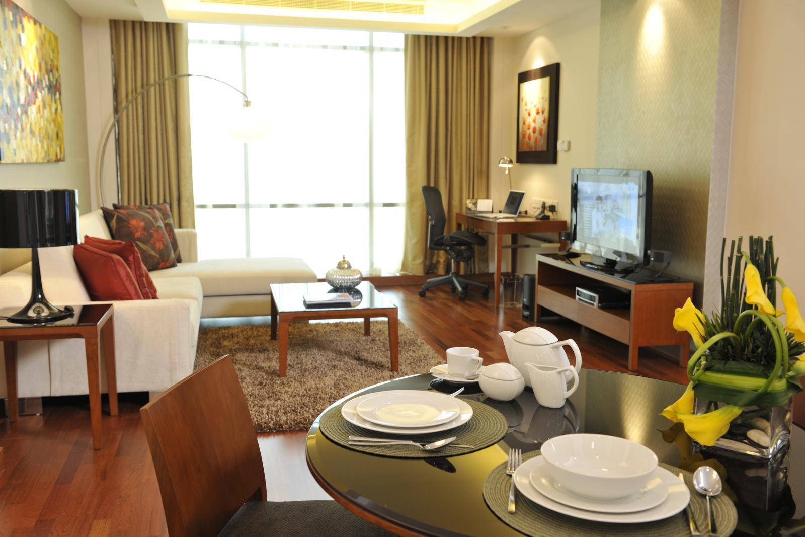 Fraser Suites Seef Bahrain Manama Quarto foto A typical apartment interior