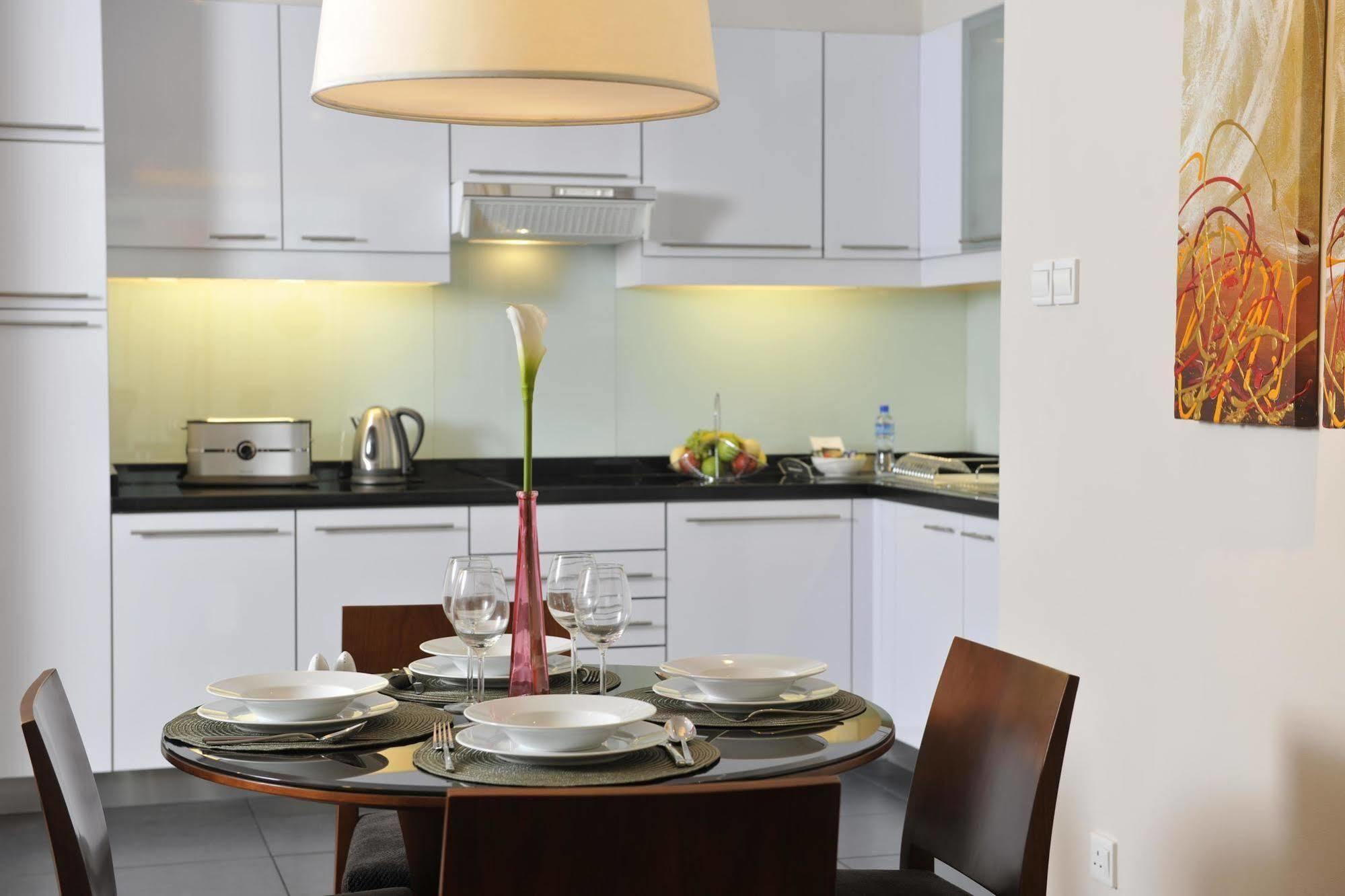 Fraser Suites Seef Bahrain Manama Quarto foto A kitchen in a serviced apartment