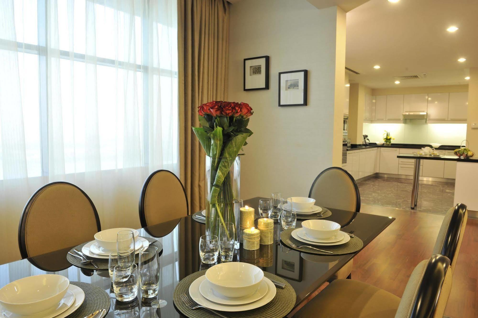 Fraser Suites Seef Bahrain Manama Quarto foto A dining room